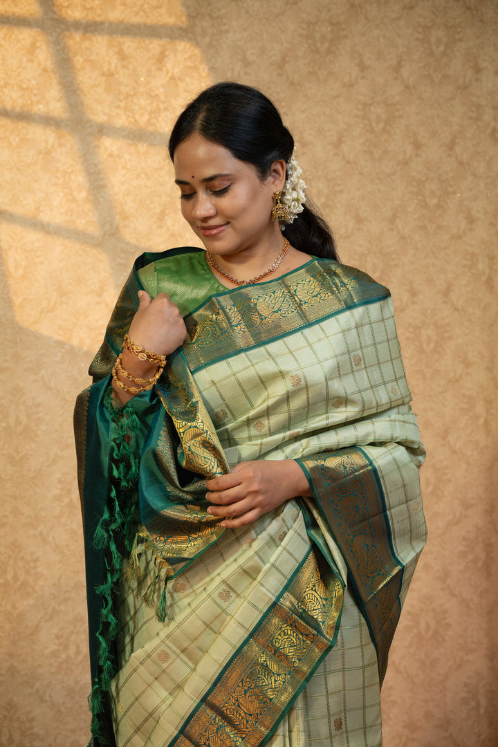 Mint green and bottle green pure kanchipuram silk saree