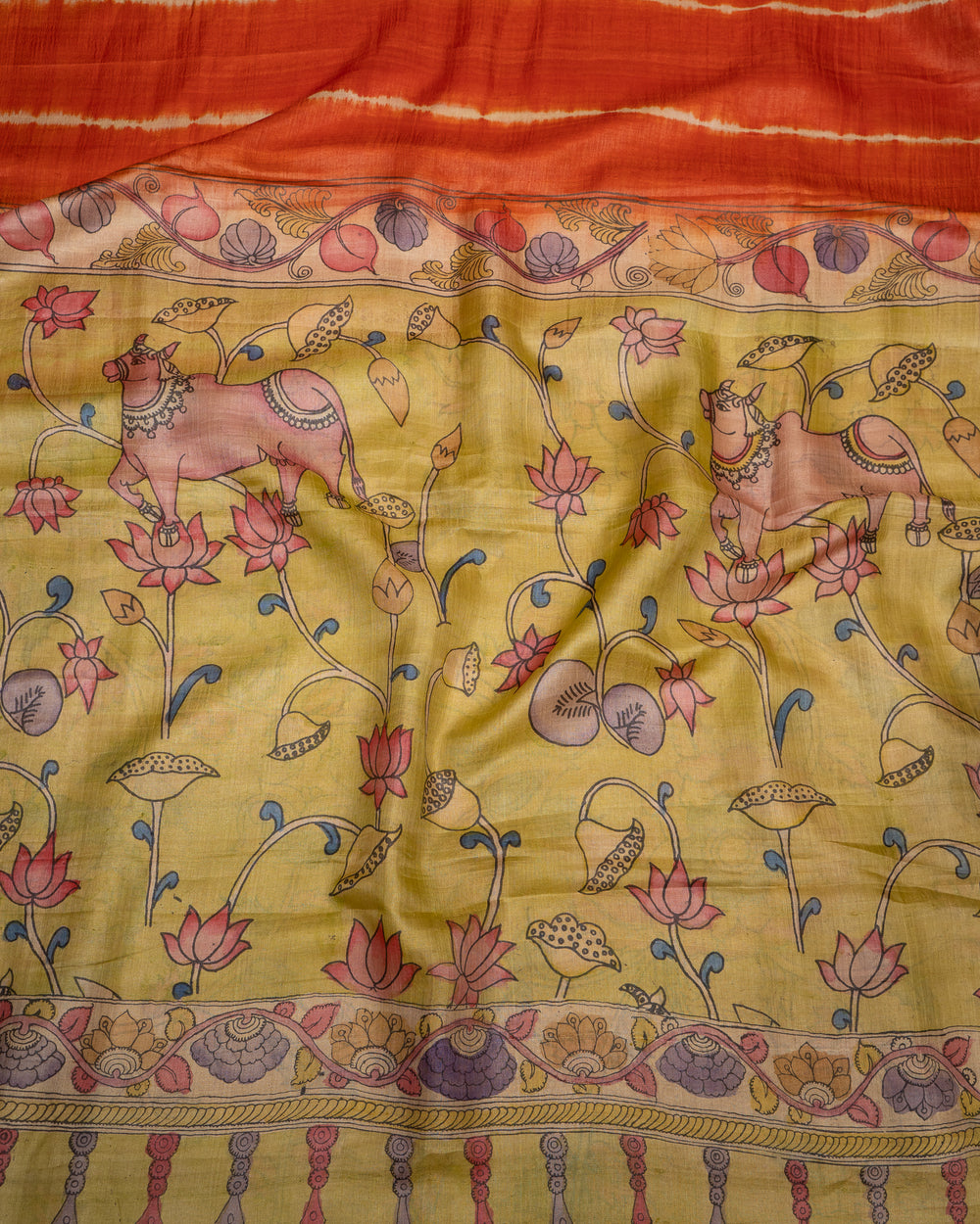 Rust Orange Tie and Dye Pichwai Hand Painted Pure Kalamkari Tussar Sari - Clio Silks
